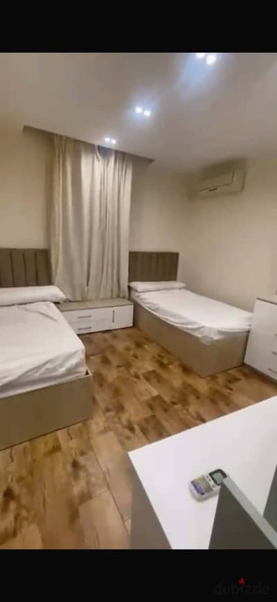 Furnished apartment for rent for upscale living in a prime location in Zahraa Al-Maadi, Sector 13, next to the Fifty Mall and Karam Al-Sham, near all services and transportation, and Carrefour ring road.