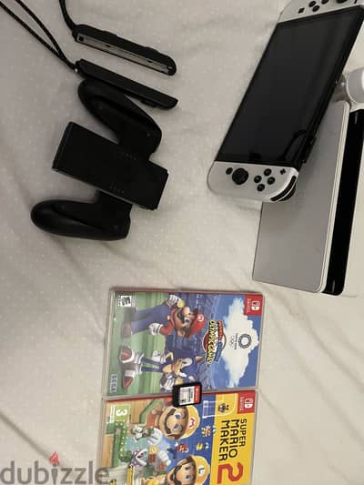 Nintendo switch very barely used with three games and all accessories