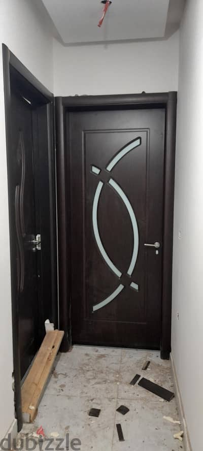 نجار  تركيبات ابواب مصفح
