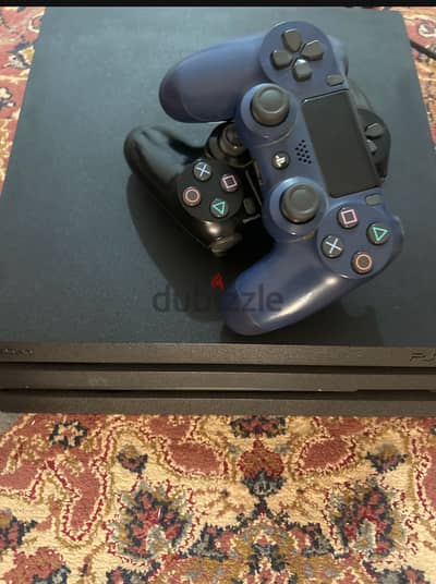 Ps4 pro barley used bought from qatar with two original controllers