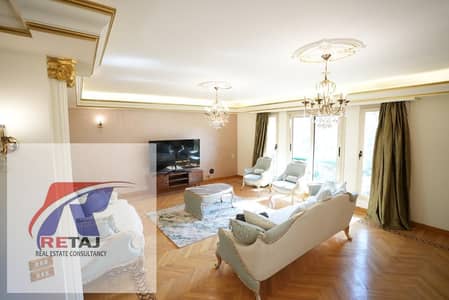 Apartment for rent with a garden view in a prime location—Al-Banafseg 5 Villas—near Sadat Axis and Al-Rehab.