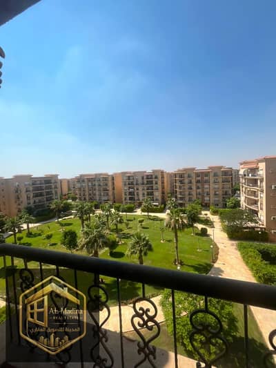 For sale, a distinctive 224 sqm apartment in Al-Rehab with semi-finishing and a garden view