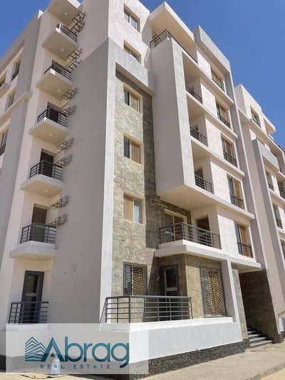 Opportunity to receive in 2027, 5% down payment, apartment for sale + garden with finishing, 10-year installments, Zayed West View