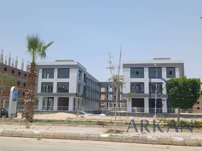Ground-floor shop, immediate delivery with an outdoor space in Hadayek October on the service axis, with installments over 3 years TA