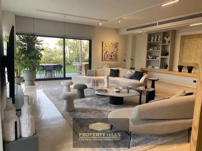 A furnished apartment unit with a view of the lakes in Sheikh Zayed behind Hyper One next to Village West