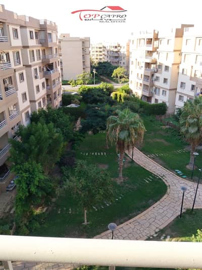 Apartment for sale in Madinaty B6  Very special opportunity in B6, 103 meter apartment in the smart model, characterized by a prime corner location and a very distinctive Wide Garden view.  The apartment is north-east, providing light.