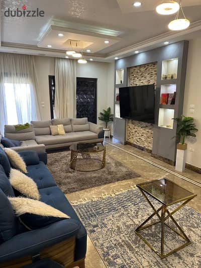 Furnished townhouse for rent in Westown, SODIC, with a prime landscape view, 5 bedrooms including 2 masters, 5 bathrooms, private garden and elevator.