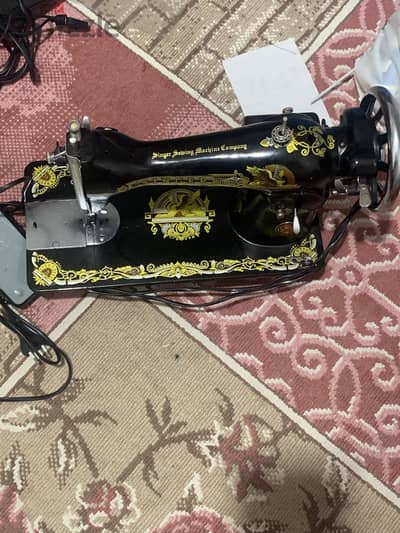 ماكينة خياطه ماركة سنجر