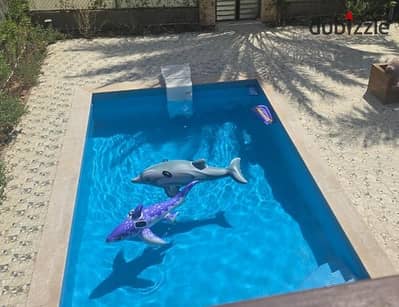 For rent, a furnished hotel villa in Madinaty, model J in V4 with a swimming pool