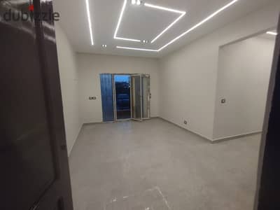 Ground-floor apartment with a garden for sale in the Rawdat Zayed compound, Sheikh Zayed.