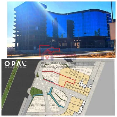 مقدم 10% ومساحة 252م  محل تجاري في OPAL Business Complex بفيو مباشر على محور الأمل MU23، واجهة رئيسية 96م