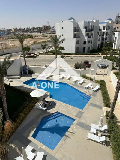 Chalet for sale with a sea view and just steps from the biggest ground-level swimming pool in a garden at Greek Marassi North Coast Sidi Abdel Rahma