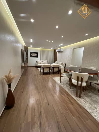Luxury 130m² fully smart apartment for sale in Mohandessin, fully furnished and equipped with appliances.