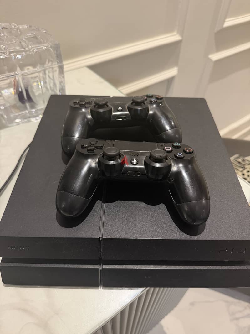 PS4 with 2 controllers 1
