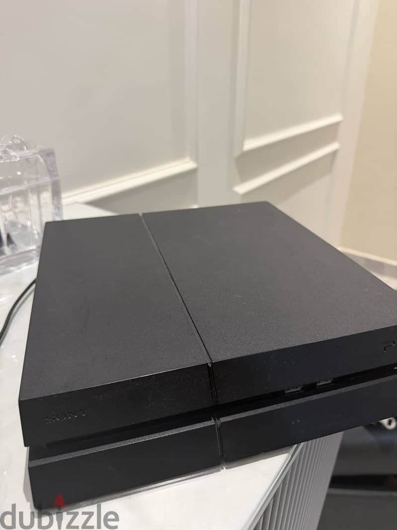 PS4 with 2 controllers 2