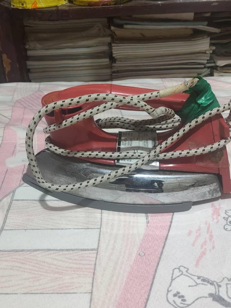 مكواه ملابس 1