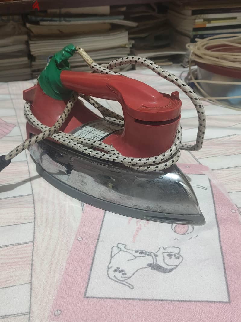 مكواه ملابس 2
