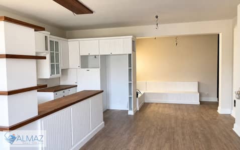 Unfurnished apartment with a kitchen for rent in the Mountain View Executive compound, Fifth Settlement. It boasts a strategic location