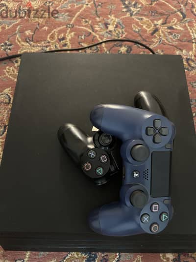 Playstation 4 pro barely used bought it from qatar