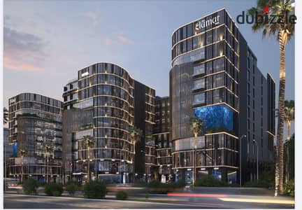 Ground-floor commercial shop for sale in Alamat Town Mall, 6th of October, directly on Central Axis. No down payment, installments up to 8 years.