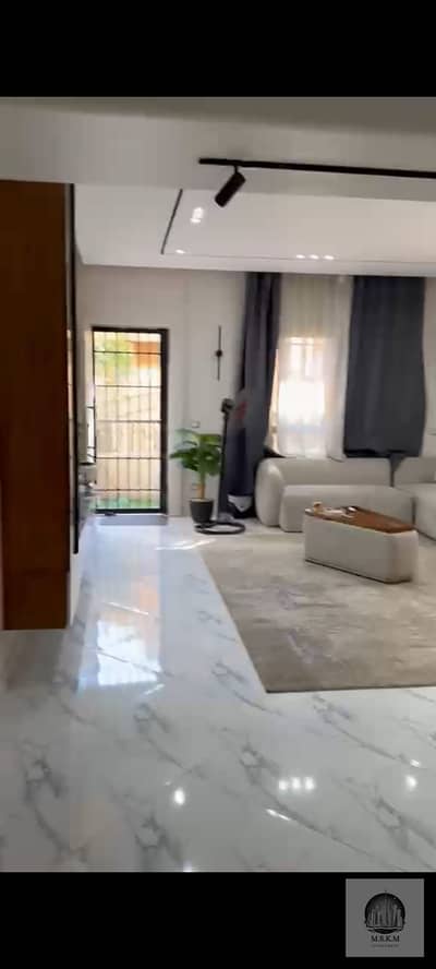 Apartment for sale in South Lotus, ground floor with a 145 sq m garden and a 75 sq m garden, 3 bedrooms and 2 bathrooms, modern finishing, kitchen and Apartment for sale in South Lotus, ground floor with a 145 sq m garden and a 75 sq m garden, 3 bedrooms and 2 bathrooms, modern finishing, kitchen and