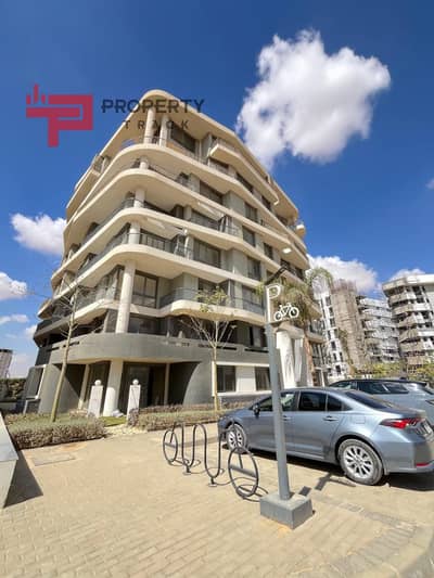 Apartment for sale at a 50% discount in the distinguished compound on the R7 axis next to the Embassy District in the new administrative capital
