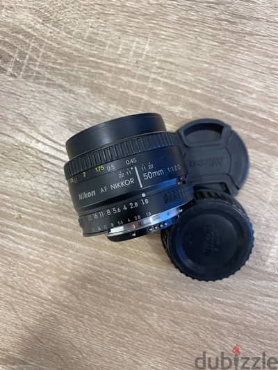 Lens Nikon 50 D الكاب الأمامي و الخلفي للبيع