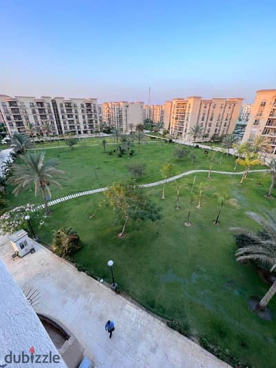 For rent a 224 sqm apartment in Al Rehab with a garden view