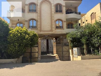 Apartment for sale in the First Settlement in front of Swan Lake Compound with a private garden and super lux finishing with parquet flooring