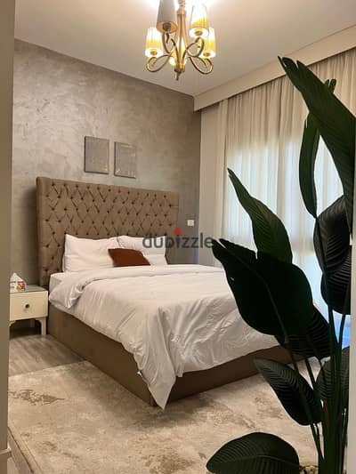 For rent furnished in BriFado Lakes 3 rooms 2 bathrooms special finishing hotel furniture fully air-conditioned high-speed internet very close to services an excellent opportunity for housing in Madinaty BriFado