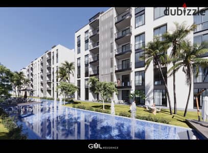 Apartment for sale in Joul Residence: 90 sqm + 65 sqm garden, Al Wahat Rd. 10% down payment, 8-year installments. Prime investment!