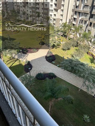 200 square meters apartment for rent new law in Madinaty finishing company in B12 garden view 3 bedrooms 3 bathrooms and living room