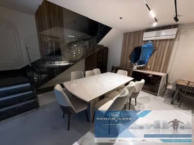 a modern twin villa in a prime location next to New Gateway Mall and Mall 2, featuring luxury finishes and comprehensive smart home systems.    Villa