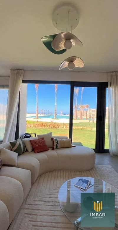 Chalet for sale, finished with furniture, first line on the swimming pool in Glee Village, North Coast, installment over 8 years without interest / close to Marina and New Alamein