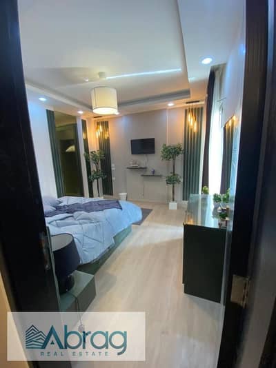 Apartment in a finished garden with immediate delivery, Fifth Settlement, Address East Compound, very distinctive location, North