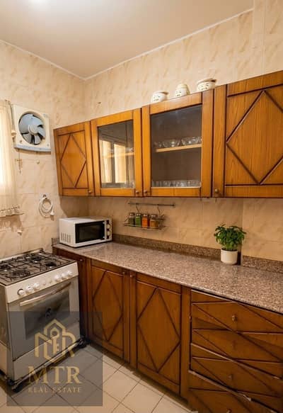 Apartment for Sale in Al Rehab with a beautiful garden view, featuring premium finishing and a prime location next to the Old Market and Medical Cente