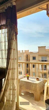 Opportunity for furnished rental at a very special price, apartment on a repeated floor with an open view directly on the main road in | Future Buildings - Sheikh Zayed