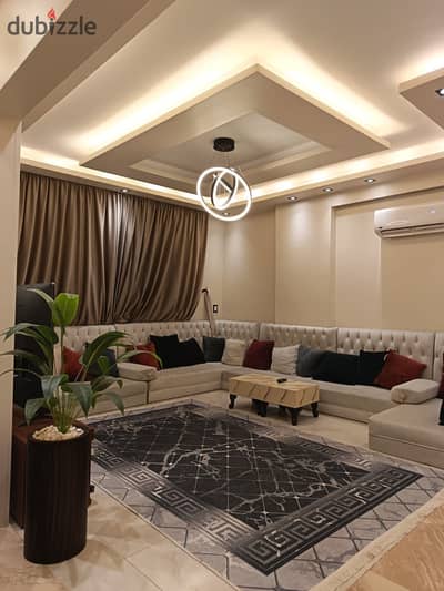 Furnished hotel apartment for daily rent in Sheraton Airport residences next to Radisson Blu Hotel and Nasr Street, 130m, two rooms, two-piece reception, fully air-conditioned and modern furnishings