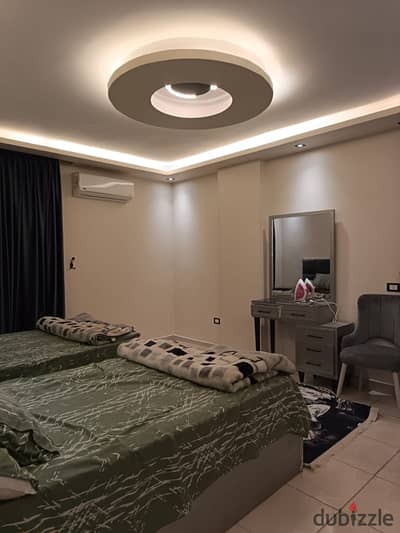 Furnished hotel apartment for monthly rent in Sheraton Airport Residence next to Radisson Blu Hotel and Al Nasr main street, 130m, two bedrooms, two-piece reception, 2 bathrooms, fully air-conditioned and modern furnishings with the latest appliances, 40 thousand EGP monthly