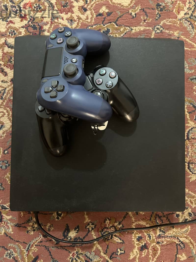 Ps4 pro with two original controllers bought from qatar 1