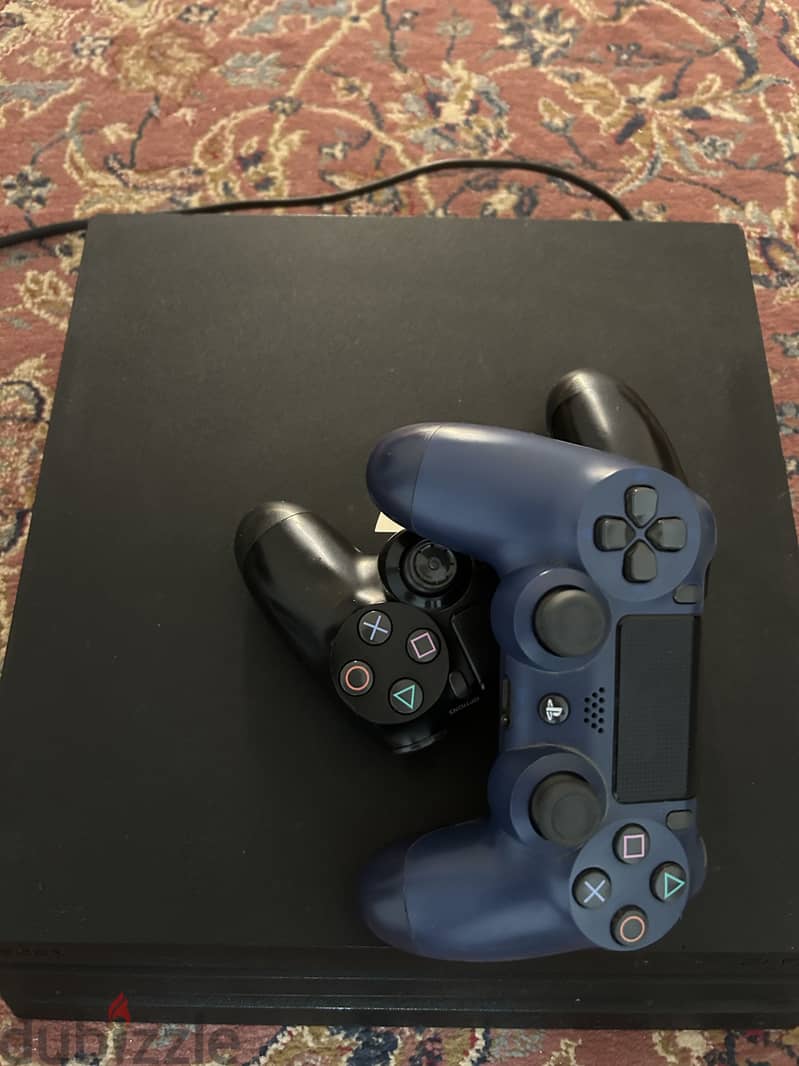 Ps4 pro with two original controllers bought from qatar 3