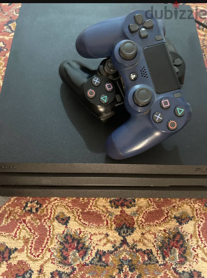 Ps4 pro with two original controllers bought from qatar 4