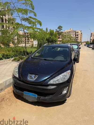 بيجو 308 إستيشن 2011