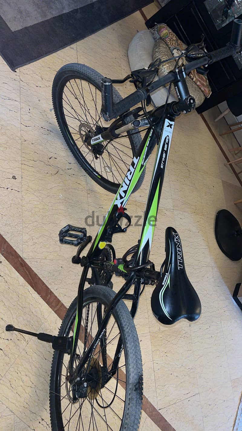 Lightly used trinx bicycle 3