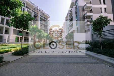 Apartment for Sale with Double Lagoon View Facing AUC at a Total Price of Only 5M EGP + Longest Payment Plan Up to 10 Y