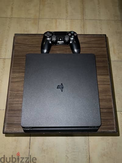 Playstation 4 Slim 1TB - Used like new Playstation 4 Slim 1TB - Used like new