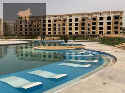 Apartment with garden for sale in Stone Residence - new cairo