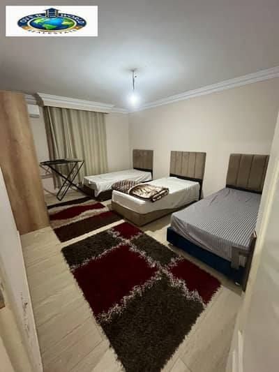 Furnished apartment for rent in Zahraa Al-Maadi, first occupancy next to Carrefour City Center, Maadi Ring and Al-Ma'araj. It consists of two bedrooms, a reception, a bathroom, and a fully air-conditioned kitchen with Wi-Fi and natural gas. New furniture, second floor, elevator.