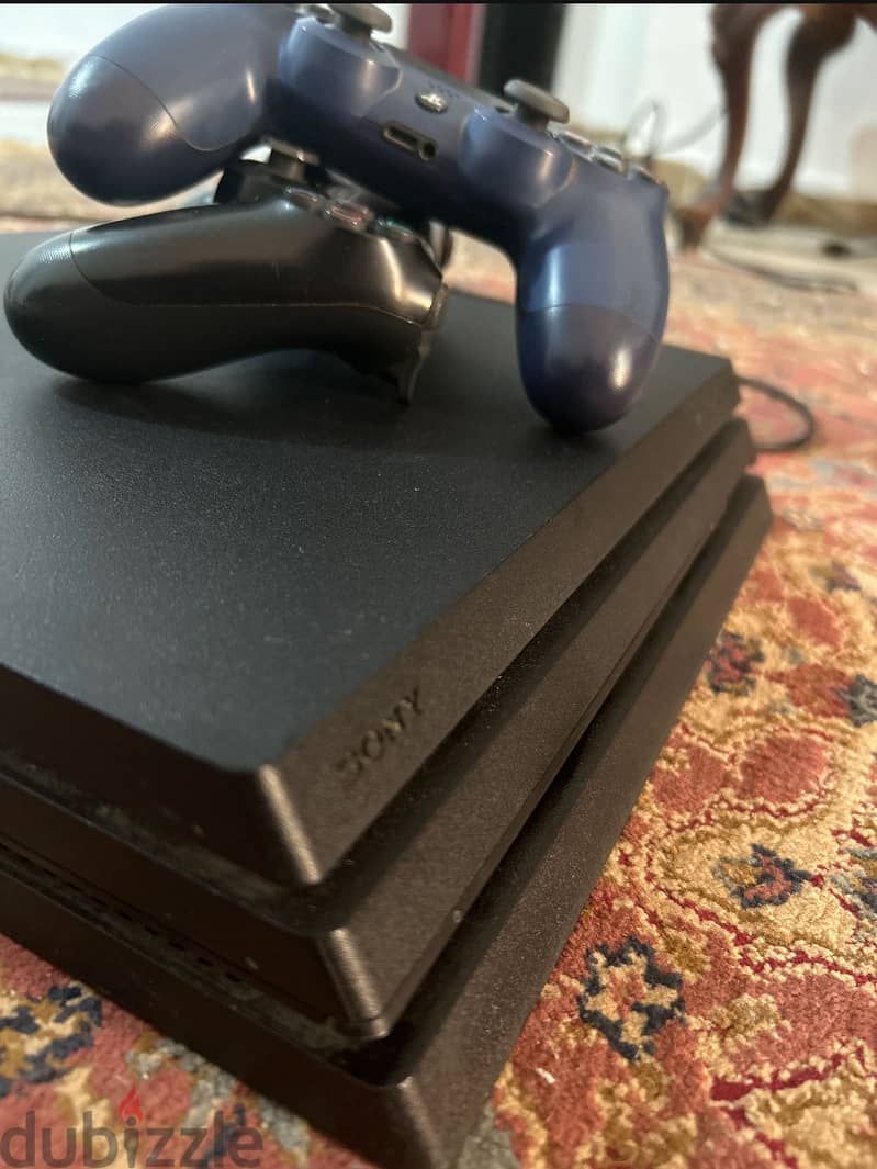 Ps4 pro barely used with two original controllers 4