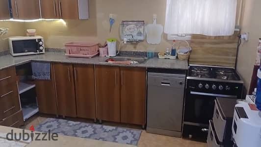 For rent, a furnished apartment at a very reasonable price in Rehab 2